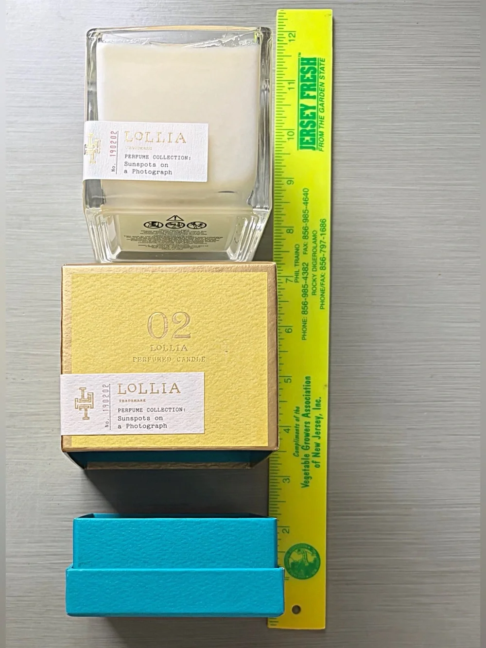 LOLLIA Poetic License Candle Margot Elena 02 Sunspots On Photograph DISCONTINUED